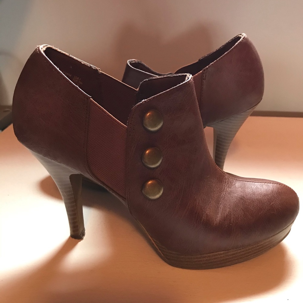 Gently worn leather heels.